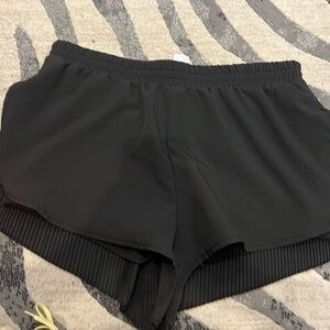Black running shorts - size L